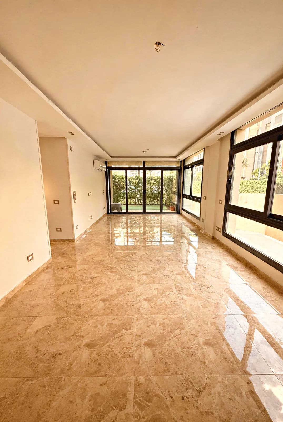 3-bedroom apartment with garden in AZAD — bright reception with garden-side windows