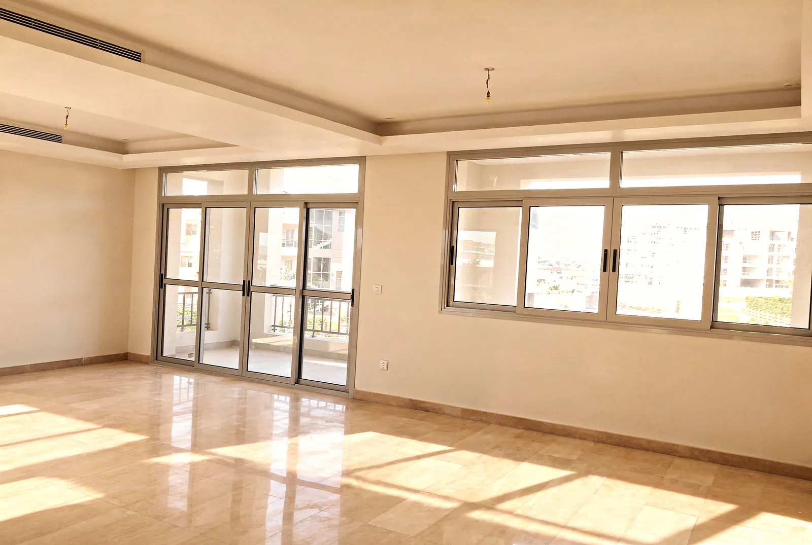 3-bedroom apartment in Festival Living, Cairo Festival City — reception with large windows