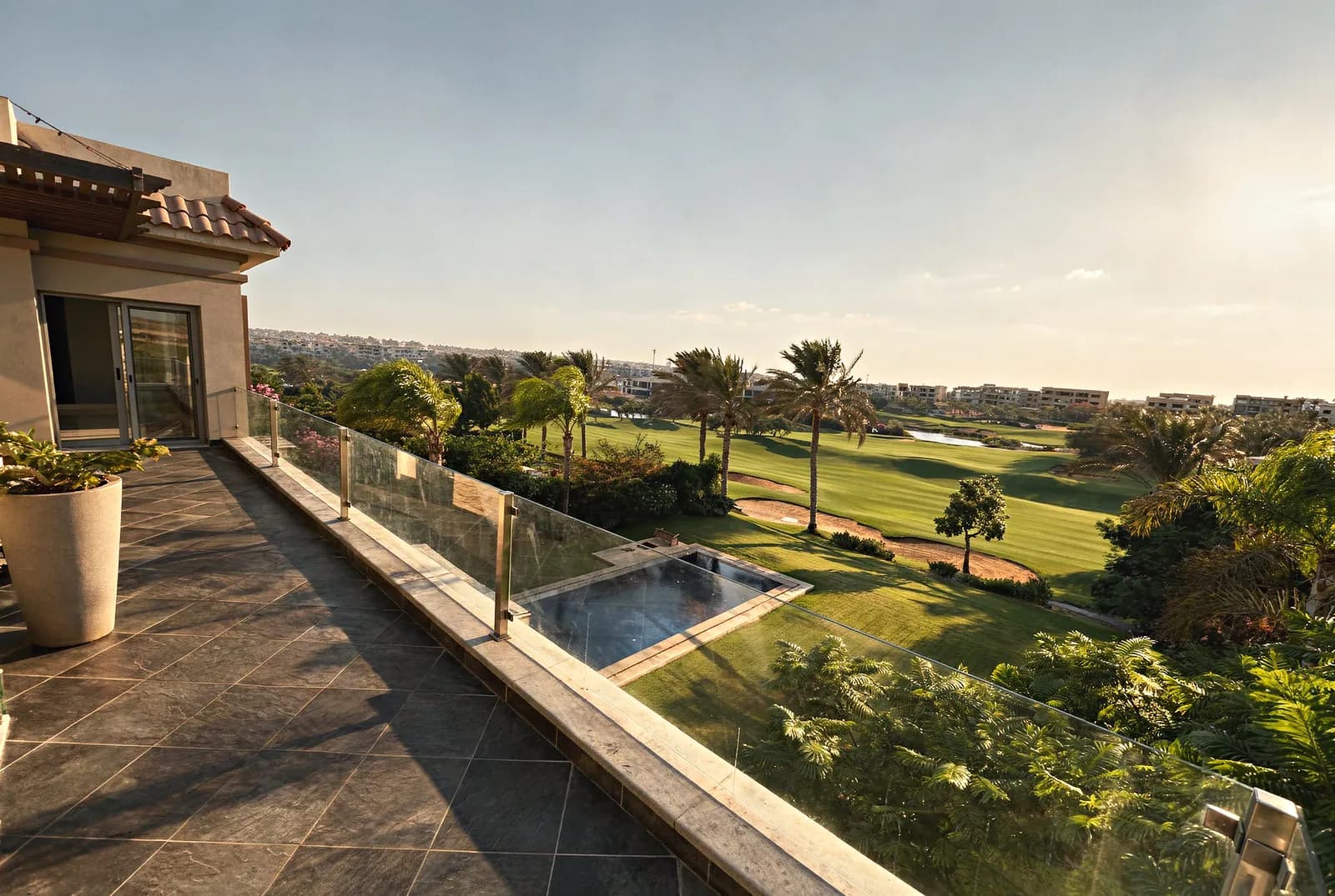 Golf-view apartment in Katameya Dunes — terrace with golf-course view
