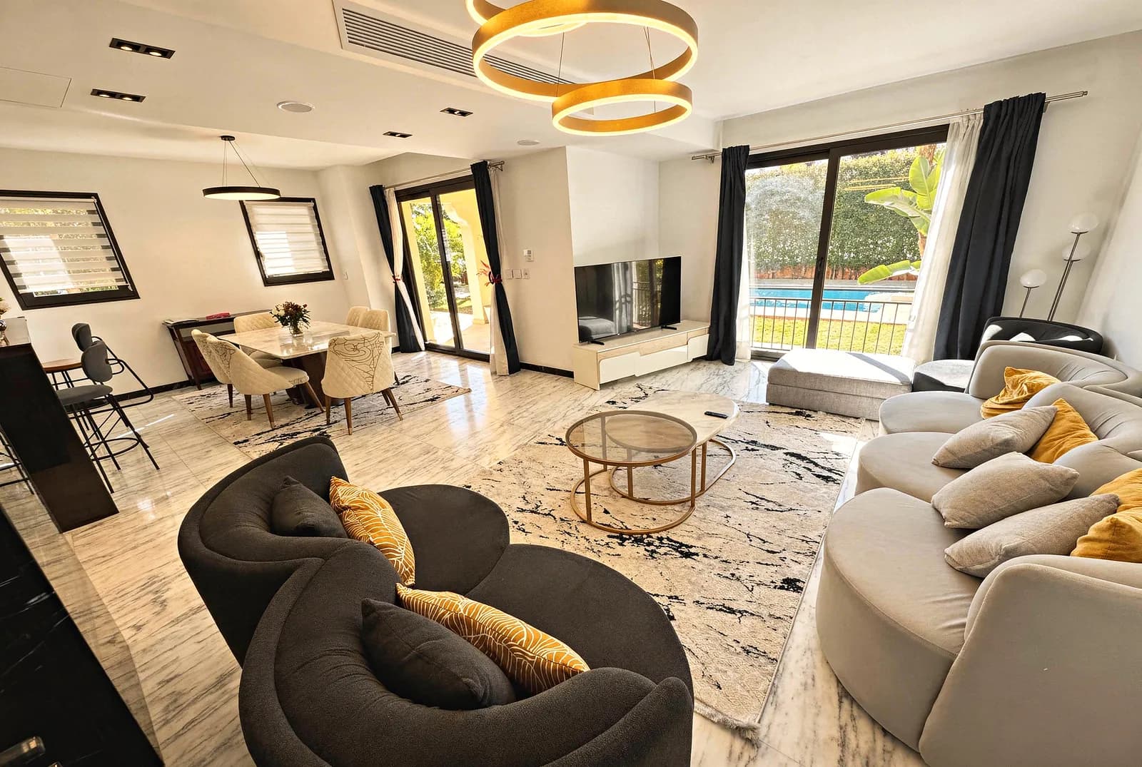 4-bedroom corner townhouse with heated pool in Mivida — photo 3 of 11